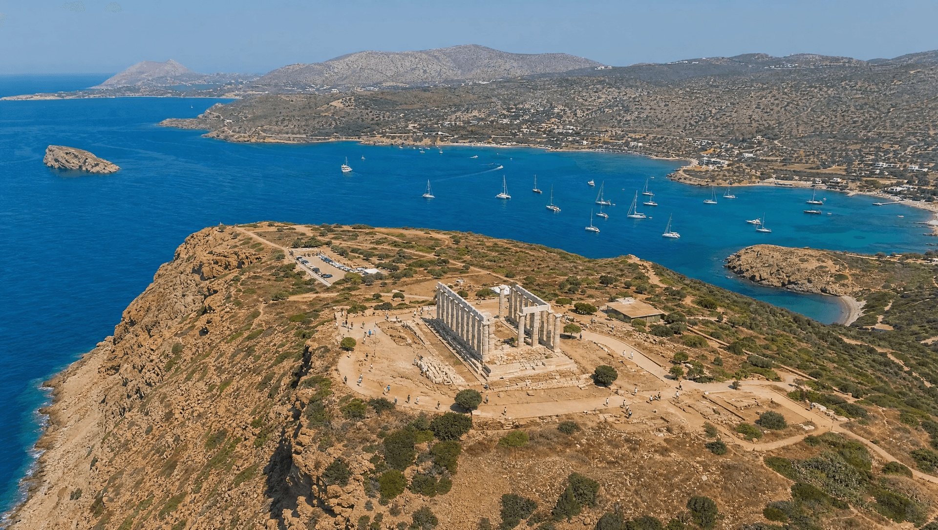 The Temple of Poseidon at Cape Sounion, reached by sea from the Athens Riviera